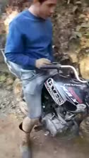 man_lighting_cigarette_with_motorcycle.webm